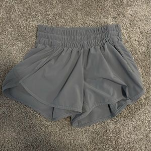 Lululemon 2 inch hottie track short; size 4. Rhino grey